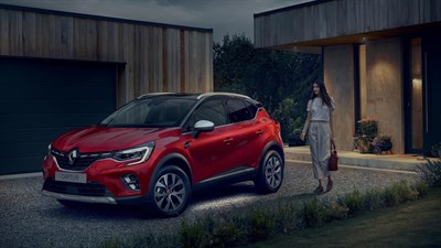 outside view of a renault captur with lights on